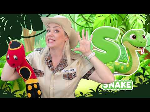 Ms Irina with a colorful snake puppet in the Into the Jungle video